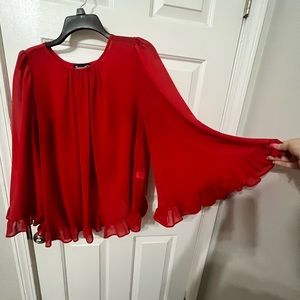 Sassy red ruffle top w/ Bell Sleeves